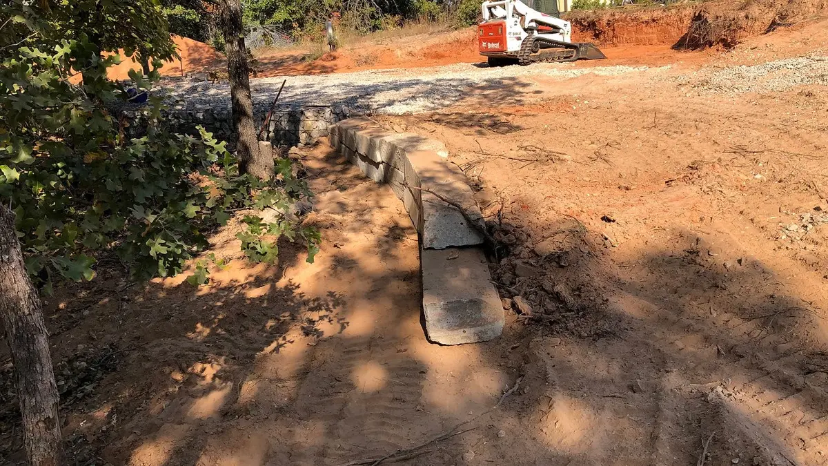 Gravel driveway graded to shed water on Osage County property