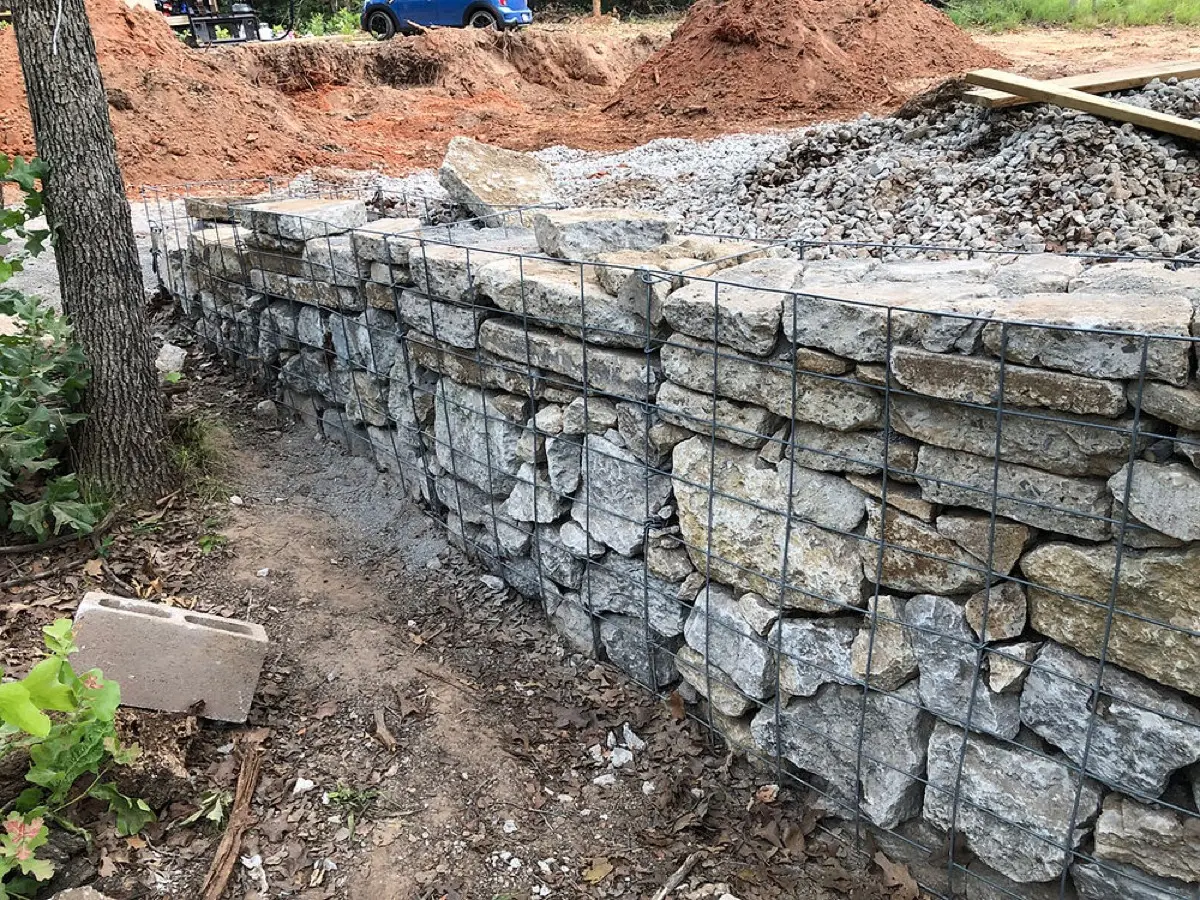 Finished retaining wall stabilizing a hillside in Osage County, Oklahoma